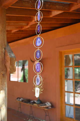 purple agate gemstone gold metal ring hanging