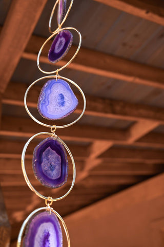 purple agate gemstone gold metal ring hanging