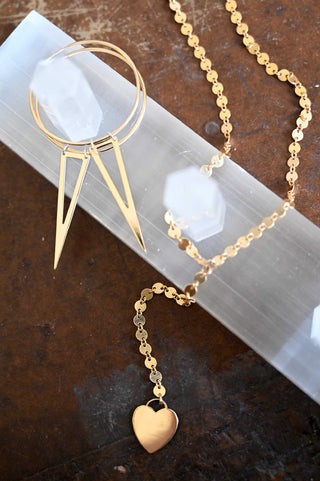 gold heart gold disc chain lariat necklace