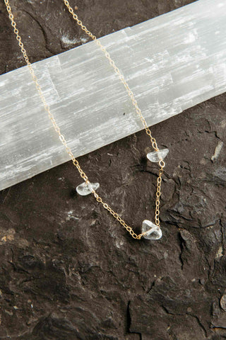clear quartz gold necklace
