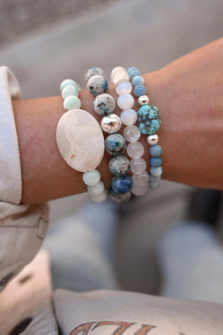 white blue green gemstone bracelet stack