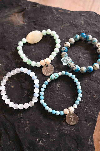 white blue green gemstone bracelet stack