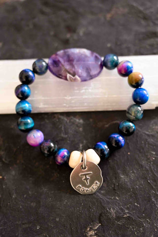 blue purple gemstone bracelet with charm