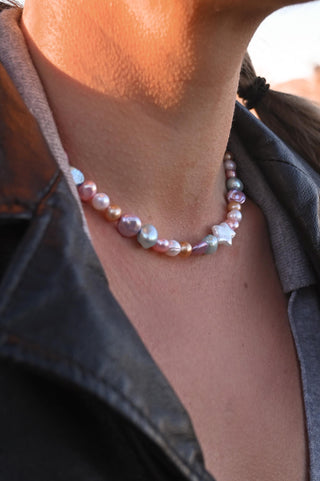 multi colored pearl necklace with white pearl star