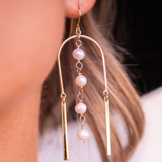 pearl gold dangle earrings